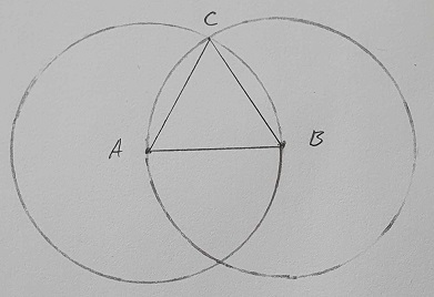 An equilateral triangle with two circles around it left over from the construction